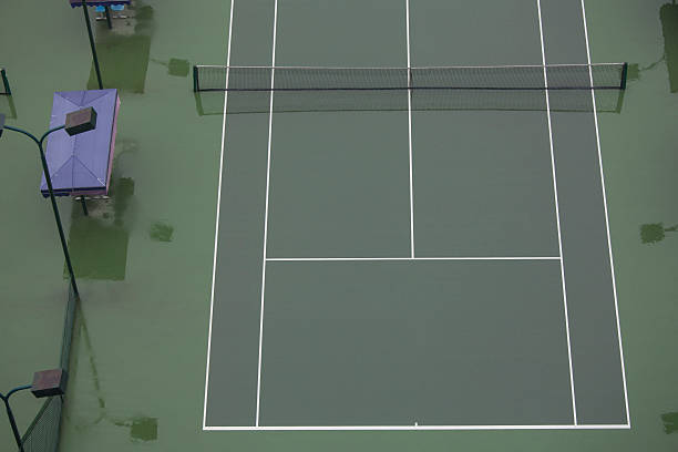 Rénovation terrain de tennis en béton poreux paris