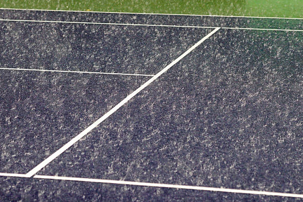 Rénovation terrain de tennis en béton poreux paris