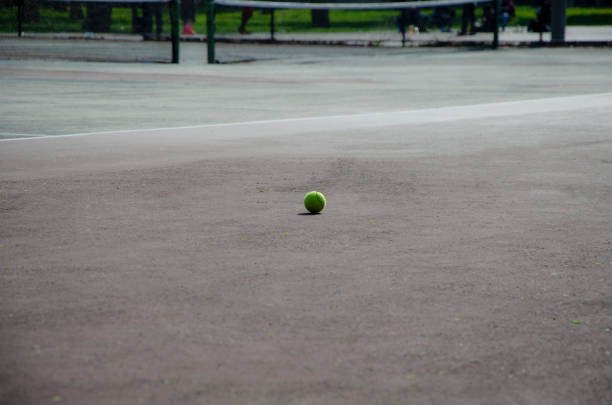 Rénovation terrain de tennis en béton poreux paris